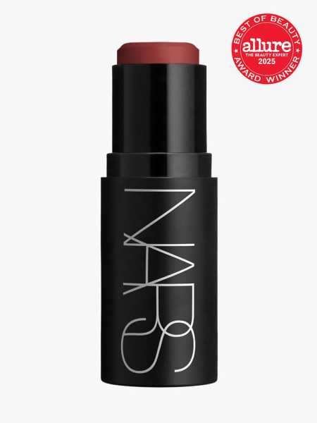 Nars The Multiple in branded black twist up applicator on light gray background with red Allure Best of Beauty seal in the top right corner
