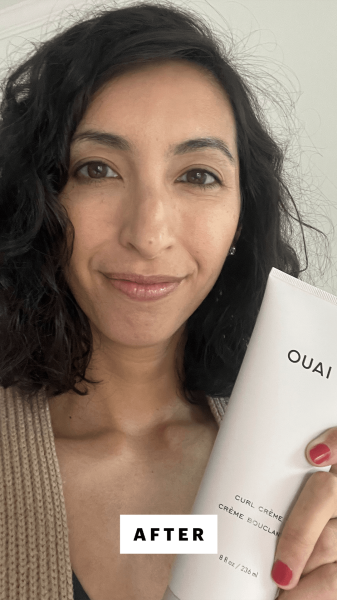Allure contributing commerce editor Deanna Pai applying the Ouai Curl Crème